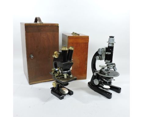 A 20th century microscope, by Swift and Son, London, no. 22839, 36cm tall, in a fitted case, together with another