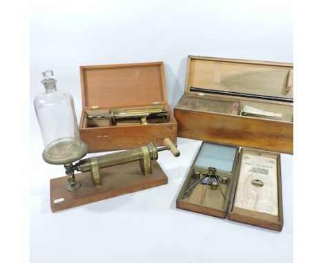 An early 20th century fuel calorimeter, by A. Gallenkamp and Co. Ltd, in a fitted case, together with a hydrometer, by Joseph
