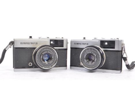 Olympus Trip - Two mid 20th century Olympus Trip 35 35mm viewfinder cameras. One camera circa 1960s, the other a later black 