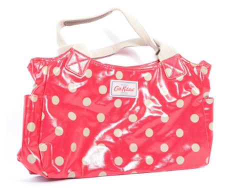 Cath Kidston - contemporary Cath Kidston, London handbag. The top handle bag being made of wipeable PVC in red with beige pol