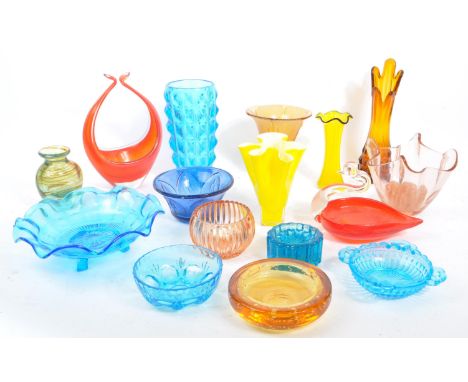A large collection of mid 20th century art glass. The collection to include a variety of glass dishes and vases, including Mu
