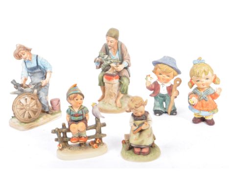 W. Goebel - A collection of early 20th century German W. Goebel and other Hummel manner figurines. The collection to include 