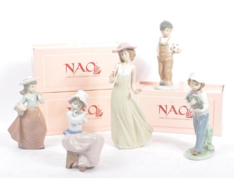 A collection of five vintage ceramic&nbsp;Nao figures / figurines for Lladro. To include;&nbsp; Three boxed figurines - Mi Am