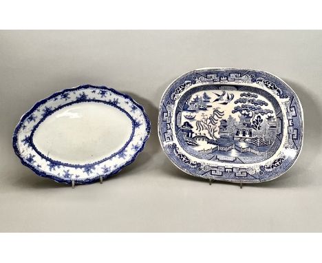 A small group of late 19th / early 20th century blue and white transfer-printed china - comprising five serving platters, inc