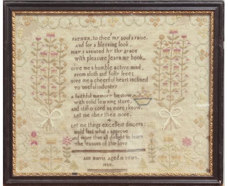 A George IV needlework sampler - inscribed 'Ann Harris Aged 10 Years. 1820.', the central verse bordered by ribbon tied flowe