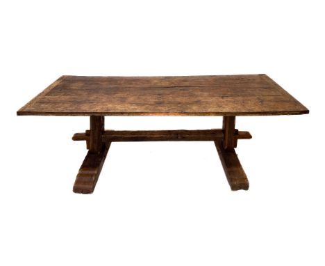 An early 18th century style oak refectory table - early to mid-20th century, constructed using earlier elements, the cleated,