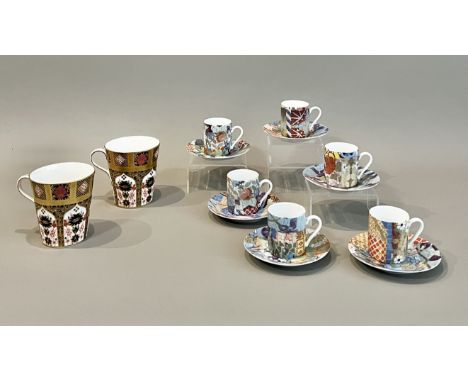 A pair of Royal Crown Derby 'Old Imari' pattern mugs - pattern no. 1128, red printed factory marks, 9.7cm high; together with