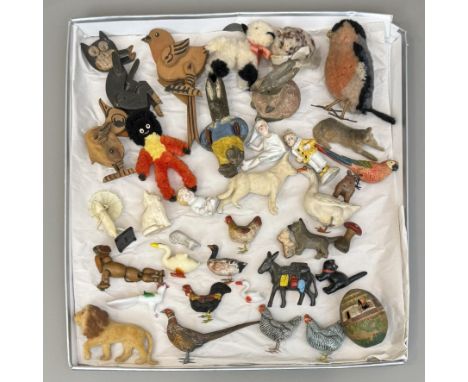 A collection of early to mid-20th century toy miniatures - including a Britains for Velos lead Father Christmas pencil sharpe