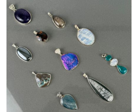 Ten mixed gemstone and fossil sterling silver pendants - including examples with Boulder Opal; Rainbow Moonstone; Labradorite