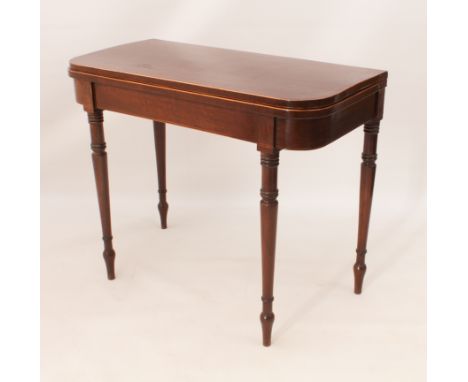 A Regency plum pudding mahogany D-shaped card table - the strung, cross banded fold-over top opening on two gatelegs, lined w