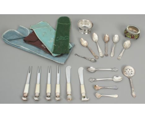 A small group of silver and silver plated items - comprising six American sterling silver souvenir spoons, early 20th century