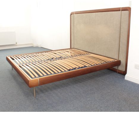 A Porada of Italy 'Killian' super king size bed - with Canaletta walnut frame to the bed base and headboard, upholstered in g