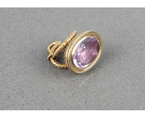 A 19th century 18ct gold and amethyst fob seal - the oval amethyst with the word 'Amatemi' ('Love Me') inscribed in gothic st