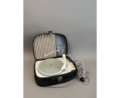 A vintage 1960s Suprophon portable record player - with 33, 45 and 78rpm settings, the black vinyl case, housing a grey paint