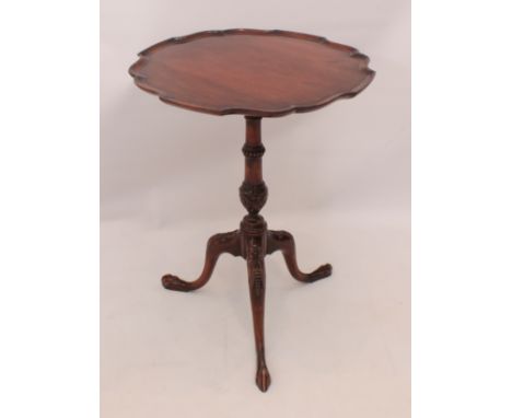 A George II style mahogany piecrust tripod table - mid-20th century, with gadrooned and foliate carved turned column, to sweo