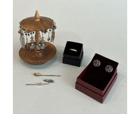 A small group of silver and white metal jewellery - including a pair of silver and amethyst openwork earrings, 16mm diameter;