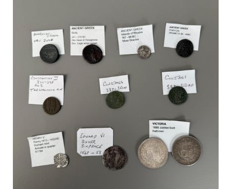 Eleven ancient and modern coins comprising: three small bronze ancient Greek;  a silver ancient Greek drachma; three late Rom