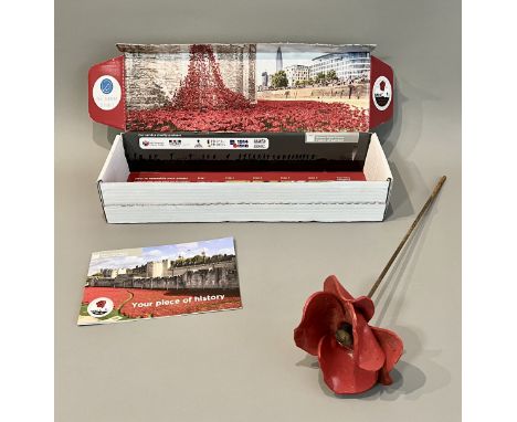 A Paul Cummins Ceramics 'Tower of London poppy - in its original box, one of the 888,246 ceramic poppies made for the incredi