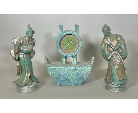 An unusual stoneware studio pottery mantel clock - late 20th century, the circular, green painted Arabic dial in a drum case 