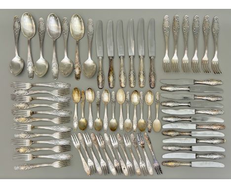 A German silver plated part-suite of flatware - mid-20th century, foliate pattern, stamped 'SILBER100', the knife blades mark