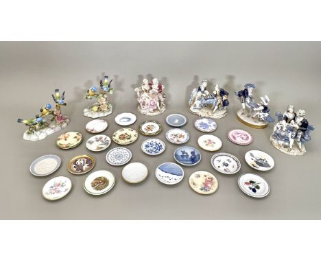 A collection of porcelain and bone china figures and miniature plates - comprising four German porcelain figural groups, thre