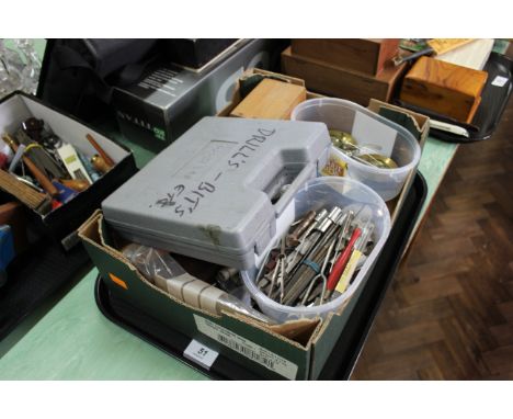 A tray of various tools, scales etc