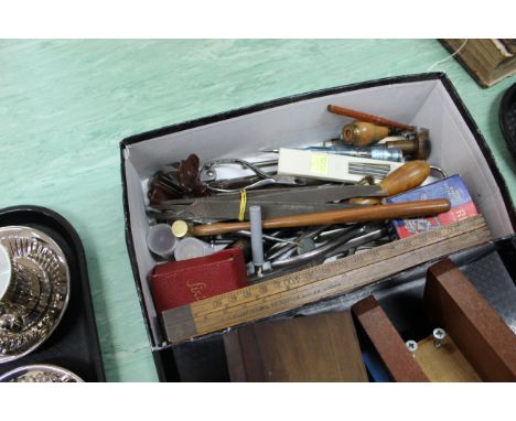 A tray with two wooden vices plus a small box of assorted tools