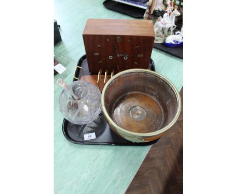 A tray with wooden cased mantel clock, metal rimmed wooden fruit bowl, a letter rack and a glass vase