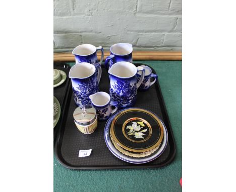 A tray with four large and two small Flow Blue jugs, a small section of plates plus a Royal Worcester egg coddler