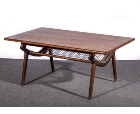 A Norwegian teak coffee table by Ganddal Mobelfabrikk, circa 1965, rectangular top, the shaped legs joined by a woven magazin