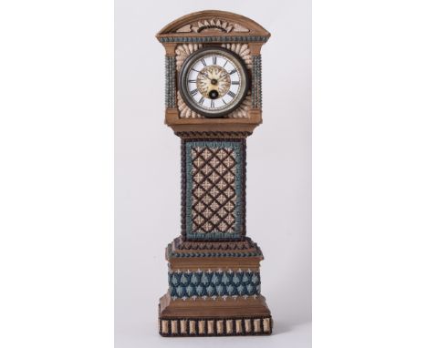 Doulton Lambeth, a Silicon Ware stoneware mantel clock, circa 1880, modelled as a longcase clock, with bead and applied decor