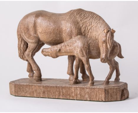 Robert 'Mouseman' Thompson of Kilburn, a carved oak model of mare and foal, adzed finish, carved signature mouse, '13' carved