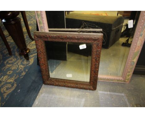 Carved wood framed mirror