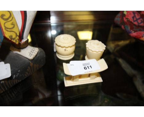 Pair antique ivory salt &amp; pepper pots (pepper A/F) &amp; an antique ivory model of an Ashanti stool