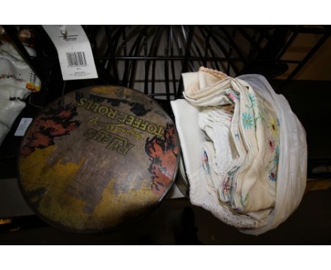 Two vintage tins and bag of soft goods