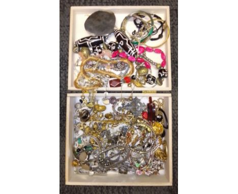 A box of assorted vintage and modern costume jewellery. 