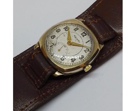 A 9ct gold Rotary wristwatch, case width 29mm, military style leather strap. 