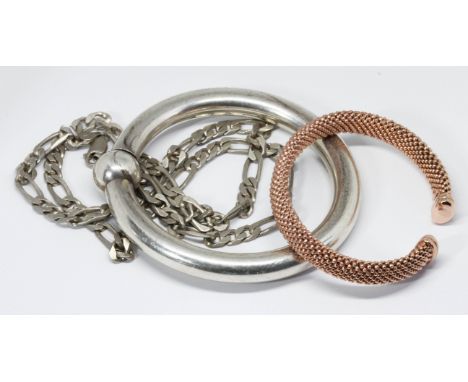 Three pieces of jewellery comprising a white metal bangle, a rose gilt bangle marked '925' and a figaro chain marked '925'. 