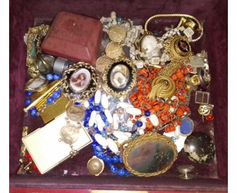 A Moroccan red leather box and contents comprising antique and vintage costume jewellery, mourning jewellery etc. 