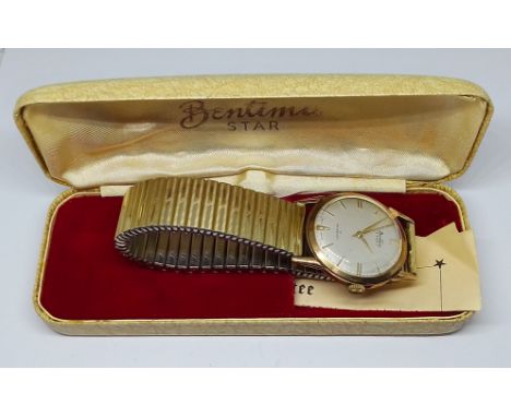 A vintage Bentima Star 9ct gold cased wristwatch, gold plated flexi strap, with original box. 