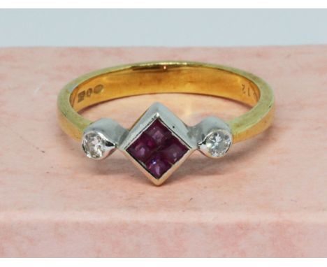 A diamond and ruby ring, marked '750', gross wt. 4.2g, size Q