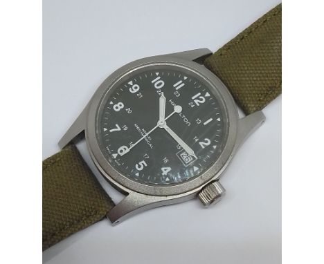 A Hamilton Field Mechanical manual wind military style wristwatch, case diam. 38mm, original canvas and leather strap, featur