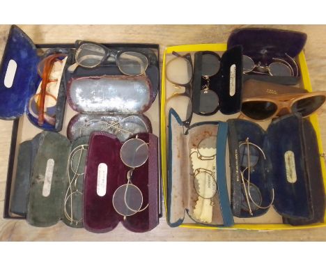 Twelve pairs of vintage spectacles. 