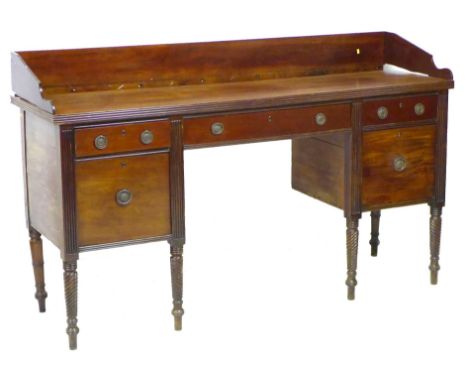 An early Victorian mahogany sideboard server, a/f condition issues requiring restoration, with twin doors flanking the centra
