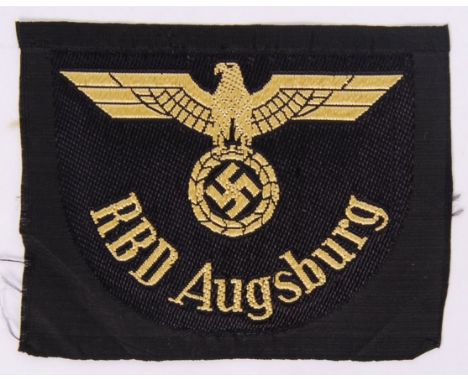 An original WWII Second World War Nazi German Third Reich railway RBD Augsburg cloth patch, with eagle swastika emblem to fro
