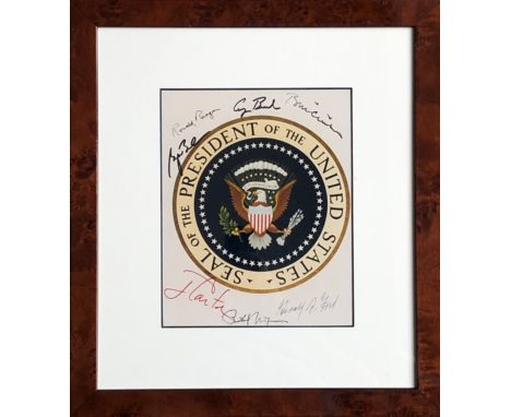 U.S PRESIDENTS: An exceptional and very rare multiple signed colour 8 x 10 photograph of the presidential seal, signed in bla