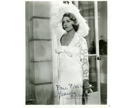 MOREAU JEANNE: (1928-2017) French actress. Signed and inscribed 8 x 10 photograph of Moreau standing in a full-length pose in