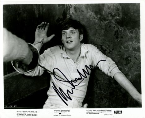 MCDOWELL MALCOLM: (1943-&nbsp;&nbsp;&nbsp;&nbsp; ) British actor. Signed 10 x 8 photograph of McDowell in a half-length pose 
