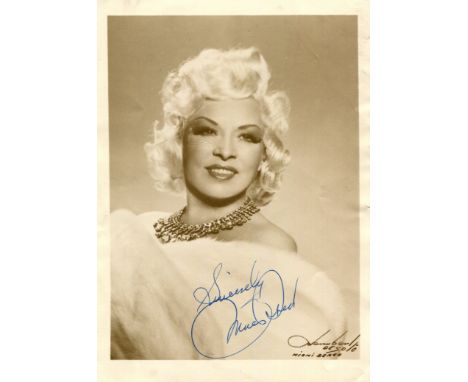 WEST MAE: (1893-1980) American Actress &amp; Sex Symbol. Vintage signed 5 x 7 photograph of West, the image depicting the act