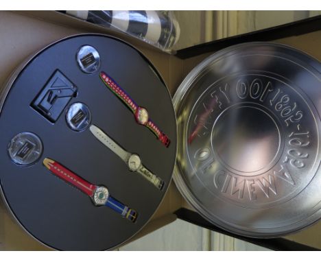 Swatch: 100 Years of Cinema, three designer wristwatches in a film tin presentation case with films by Pedro Almodovar, Rober